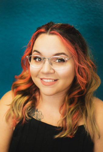 Jessenia, smiling professional hair stylist in Lakeland, FL